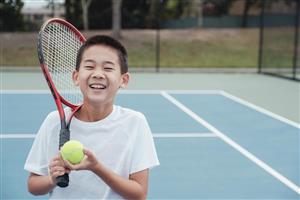 boy with tennis